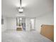 Spacious two car garage with white-painted brick walls and concrete flooring at 1708 Nw 27Th Ave, Ocala, FL 34475