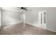 Serene main bedroom features wood-look tile flooring and neutral wall paint at 1708 Nw 27Th Ave, Ocala, FL 34475