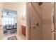Bathroom view showing a tiled shower and a vanity with wood cabinets at 1768 Sw 156Th Ln, Ocala, FL 34473