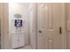 Bathroom view with white cabinets and a towel rack holding blue and white towels at 1768 Sw 156Th Ln, Ocala, FL 34473