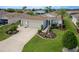 Beautiful single-Gathering home featuring an attached two-car garage and manicured lawn at 1768 Sw 156Th Ln, Ocala, FL 34473