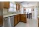 Well-appointed kitchen featuring stainless dishwasher and bright breakfast nook at 1768 Sw 156Th Ln, Ocala, FL 34473
