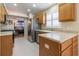 Well-lit kitchen features stainless steel appliances and ample counter space at 1768 Sw 156Th Ln, Ocala, FL 34473