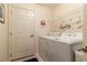 Functional laundry room with a modern washer and dryer at 1768 Sw 156Th Ln, Ocala, FL 34473