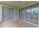 Enclosed patio with sliding glass doors that let in the light at 1768 Sw 156Th Ln, Ocala, FL 34473