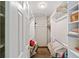 Walk-in closet with ample storage and shelving at 19130 Nw 60Th Ave, Reddick, FL 32686