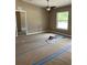 Bright bedroom with ceiling fan, neutral paint, and lots of sunlight from the window at 19622 Sw Marine Blvd, Dunnellon, FL 34431