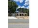 Inviting single-story home featuring an attached garage and cozy entrance at 19622 Sw Marine Blvd, Dunnellon, FL 34431