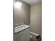 Bathroom with a white vanity, a light countertop, and a sink at 20769 Sw Oriole Dr, Dunnellon, FL 34431