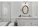 Clean bathroom featuring marble-look tile and modern fixtures at 316 Oak Track Dr, Ocala, FL 34472
