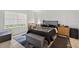 Bright bedroom with plush bedding, natural light, and neutral decor at 316 Oak Track Dr, Ocala, FL 34472