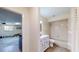 Bright bathroom featuring a vanity, framed mirror, tiled shower and tub at 4121 Sw 6Th Ave, Ocala, FL 34471