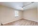 Bedroom features a window letting in natural light and wood look flooring at 4121 Sw 6Th Ave, Ocala, FL 34471
