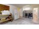 Garage interior featuring laundry machines, shelving, and lots of open space at 4121 Sw 6Th Ave, Ocala, FL 34471