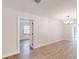 The living room has hardwood flooring, neutral walls, and modern lighting at 4121 Sw 6Th Ave, Ocala, FL 34471