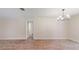 Bright living room with wood floors and modern chandelier at 4121 Sw 6Th Ave, Ocala, FL 34471