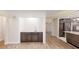 Bright living room showcases a serving counter with modern fixtures and cabinetry, offering a convenient entertaining space at 4121 Sw 6Th Ave, Ocala, FL 34471