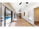 Enclosed patio with sliding doors that opens to the pool and tile flooring perfect for entertaining at 4121 Sw 6Th Ave, Ocala, FL 34471