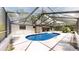 Enclosed pool area features a clean patio, with access to home and well-maintained pool for relaxation and fun at 4121 Sw 6Th Ave, Ocala, FL 34471