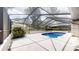 Enclosed swimming pool area with plenty of room for relaxing at 4121 Sw 6Th Ave, Ocala, FL 34471