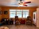 The bedroom features two decorative chairs placed by the window at 4501 Detour Rd, Haines City, FL 33844
