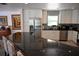 Stylish kitchen featuring granite countertops, stainless steel appliances, and mosaic tile backsplash at 4501 Detour Rd, Haines City, FL 33844
