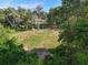 Aerial view of land featuring mature trees and partially cleared areas at 4501 Detour Rd, Haines City, FL 33844