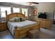 Comfortable main bedroom has neutral colors, ceiling fan, and windows with lots of natural light at 4501 Detour Rd, Haines City, FL 33844