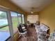 This bright lanai is perfect for entertaining, with comfortable seating and lots of natural light at 4622 Ne 15Th St, Ocala, FL 34470