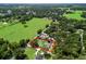 Aerial view of the property with verdant surroundings at 4660 Se 142Nd Ln, Summerfield, FL 34491