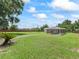 Large, flat backyard with pool and detached garage at 4660 Se 142Nd Ln, Summerfield, FL 34491