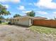 Exterior view of the property showcasing the backyard and side yard at 4660 Se 142Nd Ln, Summerfield, FL 34491