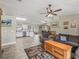 Spacious living room flows into the kitchen and dining area, creating an open and airy feel at 4660 Se 142Nd Ln, Summerfield, FL 34491