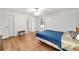 Spacious bedroom featuring wood laminate flooring and natural light at 475 Ne 155Th Pl, Citra, FL 32113
