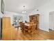 Dining room area features a wooden table and chairs with a hutch at 475 Ne 155Th Pl, Citra, FL 32113