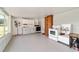 Spacious kitchen area features white appliances, laminate countertops, and a full-sized window at 475 Ne 155Th Pl, Citra, FL 32113