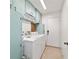 Laundry room featuring a washer and dryer with ample cabinet space at 475 Ne 155Th Pl, Citra, FL 32113