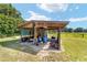 A lean-to structure for outdoor storage at 475 Ne 155Th Pl, Citra, FL 32113
