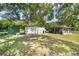 A collection of outdoor sheds and storage areas for equipment and supplies at 475 Ne 155Th Pl, Citra, FL 32113