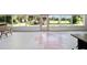 Bright sunroom with floor-to-ceiling windows offering backyard views at 475 Ne 155Th Pl, Citra, FL 32113