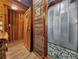 Bathroom with natural wood finishes, a pebbled shower floor, and a unique industrial shower design at 5630 Se 183Rd Avenue Rd, Ocklawaha, FL 32179
