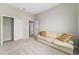 Bedroom featuring a sofa, closet, and neutral carpeting for a cozy space at 6299 Sw 90Th St, Ocala, FL 34476