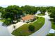 Sprawling single-story home featuring a large yard, mature trees, and a two-car garage at 6551 Se 11Th Loop, Ocala, FL 34472