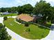 Charming single-story home with a well-manicured lawn and mature shade trees nestled on a corner lot at 6551 Se 11Th Loop, Ocala, FL 34472