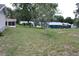 Expansive backyard offering plenty of space for recreation and relaxation in a serene setting at 8650 Sw 108Th Pl, Ocala, FL 34481