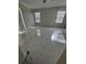 Bright living room featuring neutral walls, tile flooring, and plenty of natural light at 9238 Sw 60Th Court Rd, Ocala, FL 34476