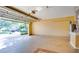 Spacious garage opens to the outside with access to mechanicals and home at 949 Woodsong Way, Clermont, FL 34714