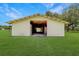 Well-maintained barn with ample space for horses, equipment, and hay storage, providing a safe and functional environment at 975 Cr 542E, Bushnell, FL 33513