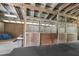 Indoor horse stalls with wood and metal dividers provide a safe and comfortable area for horses to relax and enjoy their surroundings at 975 Cr 542E, Bushnell, FL 33513