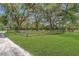 Beautiful acreage with mature trees and perimeter fencing at 975 Cr 542E, Bushnell, FL 33513